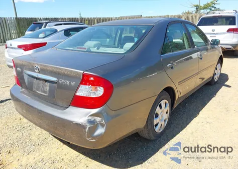 2002 Toyota Camry Le from USA, damaged, VIN 4T1BE32K12U589738